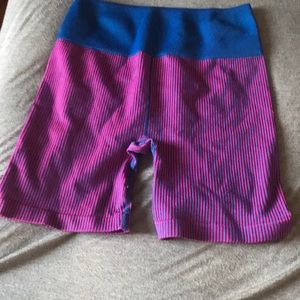 Blue shorts with pink stripes and stretchy to move around in